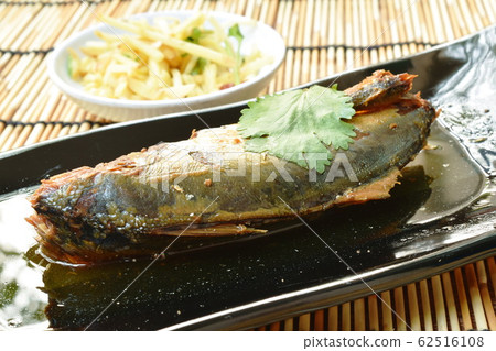 boiled salty mackerel fish in soy sauce soup on palte boiled salty mackerel fish in soy sauce soup on palte 62516108