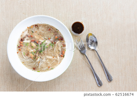 Soto ayam bihun, popular Indonesian noodle soup in 62516674
