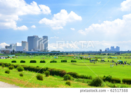 A view of the high-rise buildings of Futako Tamagawa and Musashi-Kosugi from the Tama River riverbed in Tokyo A view of the high-rise buildings of Futako Tamagawa and Musashi-Kosugi from the Tama River riverbed in Tokyo 62517388