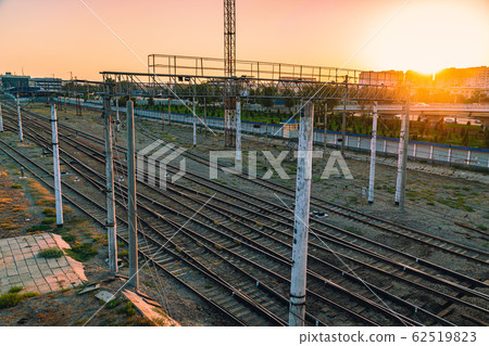 A lot of railway tracks on sunset A lot of railway tracks on sunset 62519823