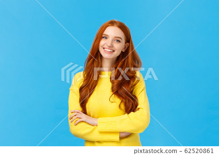 People, communication and lifestyle concept. Waist-up shot cheerful outgoing redhead pretty woman with curly hair, yellow sweater, cross arms chest relaxed pose, smiling, chatting coworker People, communication and lifestyle concept. Waist-up shot cheerful outgoing redhead pretty woman with curly hair, yellow sweater, cross arms chest relaxed pose, smiling, chatting coworker 62520861