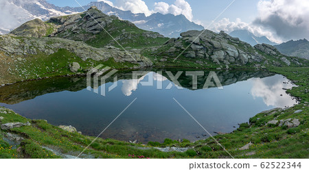 Mountain lake in alps landscape trek Mountain lake in alps landscape trek 62522344