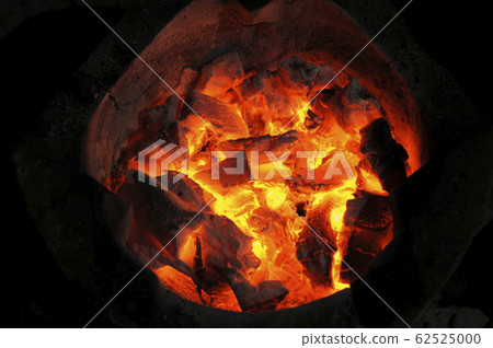 fire flames with sparks on a black background fire flames with sparks on a black background 62525000