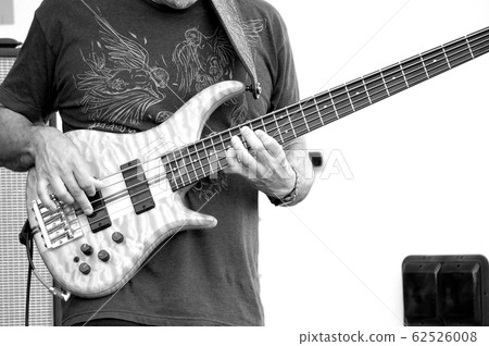 Bass guitarist. Bass guitarist. 62526008