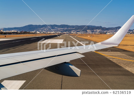 Itami Airport runway and wings Itami Airport runway and wings 62536519