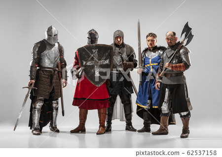 Brave armored knights fighting isolated on white studio background Brave armored knights fighting isolated on white studio background 62537158
