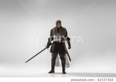 Brave armored knight fighting isolated on white studio background Brave armored knight fighting isolated on white studio background 62537168