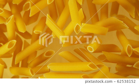 Freeze motion of flying uncooked pasta Freeze motion of flying uncooked pasta 62538152