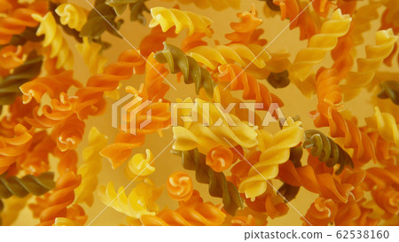 Freeze motion of flying uncooked pasta Freeze motion of flying uncooked pasta 62538160