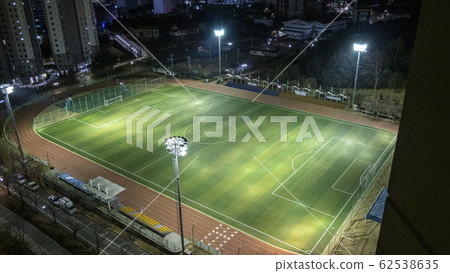 Soccer field with night lights Soccer field with night lights 62538635