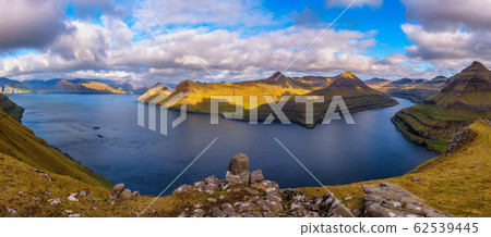 Panorama of fjords near the village of Funningur in Faroe Islands, Denmark 62539445