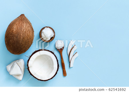 Coconut oil in a bowl with a spoon Coconut oil in a bowl with a spoon 62541692