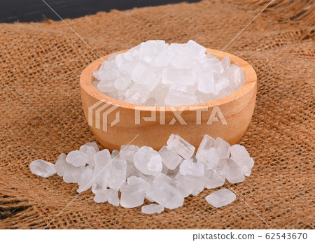Rock sugar on wooden background 62543670