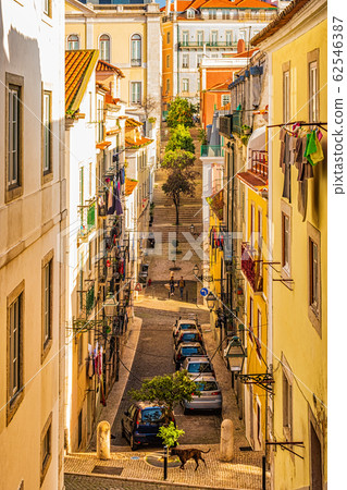 Narrow, authentic street of Lisbon, Portugal Narrow, authentic street of Lisbon, Portugal 62546387