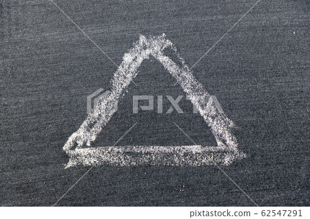 White color chalk hand drawing in triangle shape White color chalk hand drawing in triangle shape 62547291
