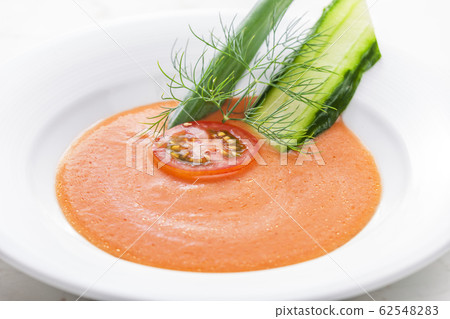gazpacho - vegetable soup made of tomato and 62548283