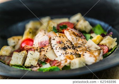 Fresh and healthy vegetable salad with meat Fresh and healthy vegetable salad with meat 62548896