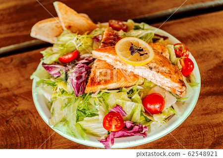 Fresh and healthy vegetable salad with meat 62548921