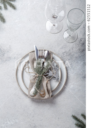 Cristmas table cutlery set with holiday decoration. Top view, copy space Cristmas table cutlery set with holiday decoration. Top view, copy space 62551512