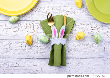 Easter table setting in green color Easter table setting in green color 62551829