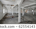 Empty industrial room of an old abandoned factory 62554143