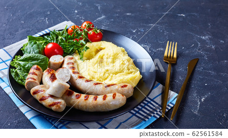 French side dish potato aligot with tomato salad French side dish potato aligot with tomato salad 62561584