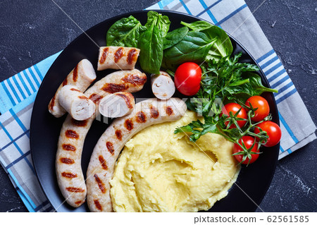 French food cheesy potato aligot with sausages French food cheesy potato aligot with sausages 62561585