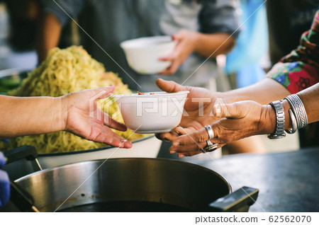 Famine and food shortages, resulting in food donations to help the hungry 62562070