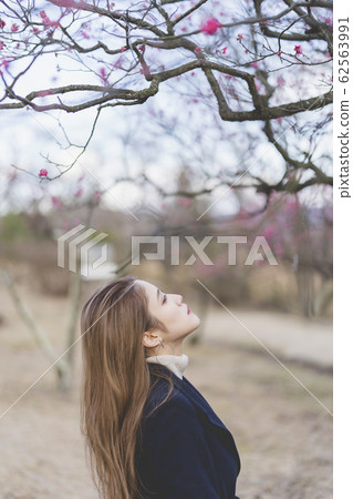 A woman in the park A woman in the park 62563991