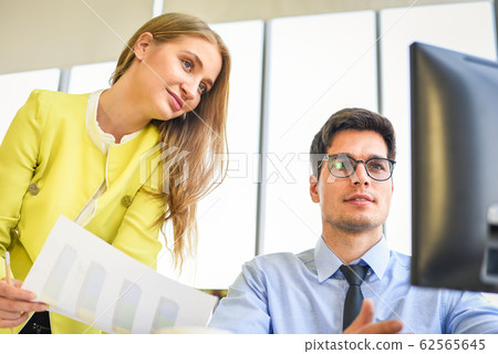 Business people in meeting discussing about Business people in meeting discussing about 62565645