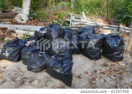 Pile of garbage plastic bag in the nature garbage Pile of garbage plastic bag in the nature garbage 62565708