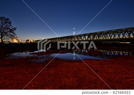 Cityscape-Tokyo Sky Tree and Railway Evening View from Arakawa Bank Cityscape-Tokyo Sky Tree and Railway Evening View from Arakawa Bank 62566881
