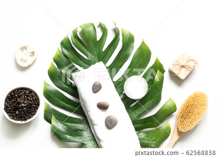 Monstera leaf, brush, coffee beans, SPA set Monstera leaf, brush, coffee beans, SPA set 62568838