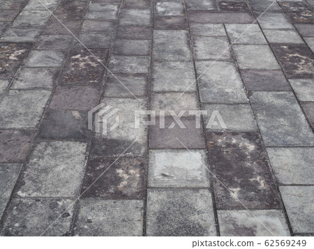 Old stone pavement 62569249