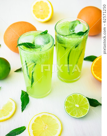 Refreshing cucumber drink with limes and lemons. Organic summer drinks 62571250