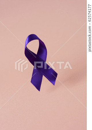 purple ribbon on a pink background. 62574177