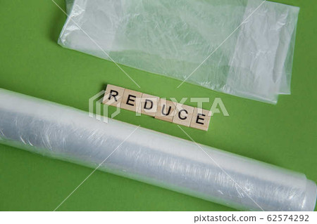 reduce, reuse and recycle word in vintage wooden letterpress type blocks, flatlay on green font 62574292