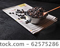 Roasted coffee beans in a bowl 62575286