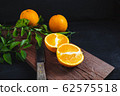 Fresh citrus fruit on the table 62575518