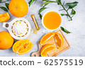Freshly squeezed orange juice and citrus fruits 62575519
