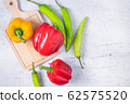 Fresh paprika on the wooden background 62575520