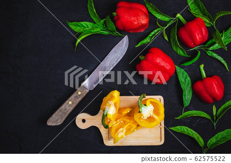 Fresh paprika on the wooden background Fresh paprika on the wooden background 62575522