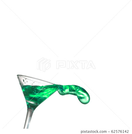 Green alcoholic cocktail on white isolate splash 62576142