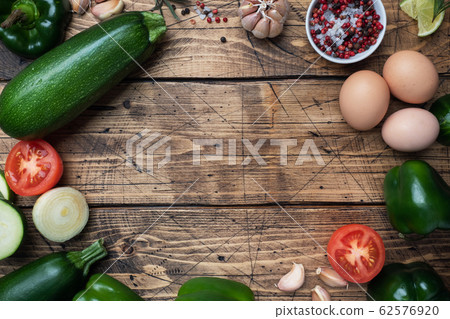 Raw fresh products for cooking vegetable omelet on Raw fresh products for cooking vegetable omelet on 62576920