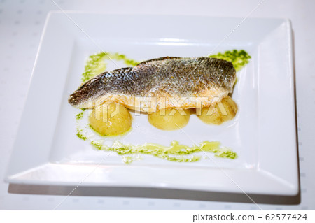 Fried Dorada Fillet with egg, chives and thyme 62577424
