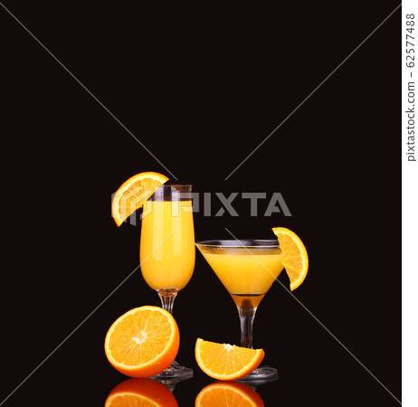 fresh organic orange juice and vodka in a tall 62577488