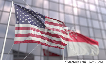 Waving flags of the United States and Singapore in front of a modern skyscraper. 3D rendering Waving flags of the United States and Singapore in front of a modern skyscraper. 3D rendering 62579261