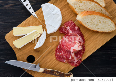 Overhead view of camembert sandwich with bacon Overhead view of camembert sandwich with bacon 62579941
