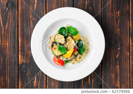 Top view of roasted aubergine with bell pepper Top view of roasted aubergine with bell pepper 62579998