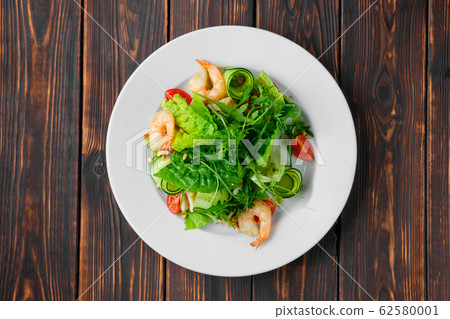 Overhead view of salad with shrimps, squid, Overhead view of salad with shrimps, squid, 62580001